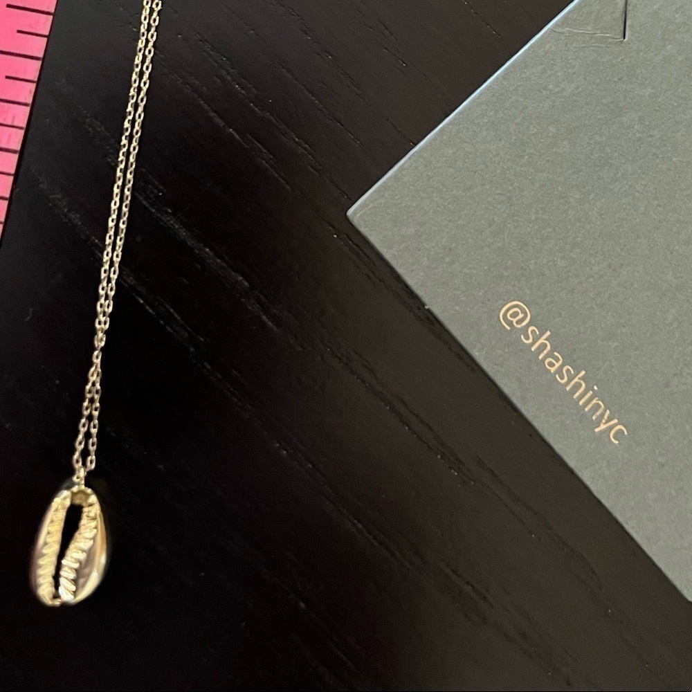 Sashi Gold Tone Shell Necklace - Picture 9 of 14
